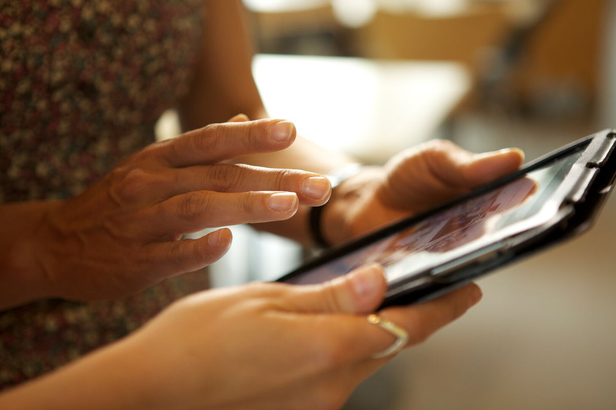 woman with ipad